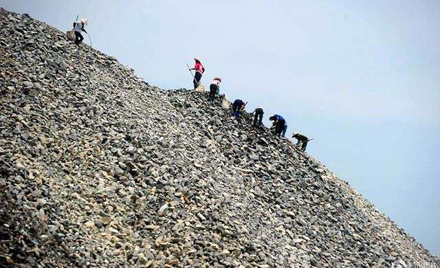 workers in limestone mine